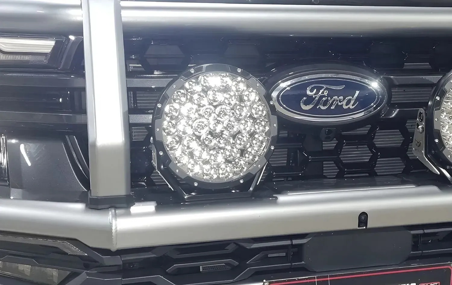 Close-up of a Ford Truck Grill With a Bull Bar — Sparky's 4x4 Auto Electrical In Taminda, NSW