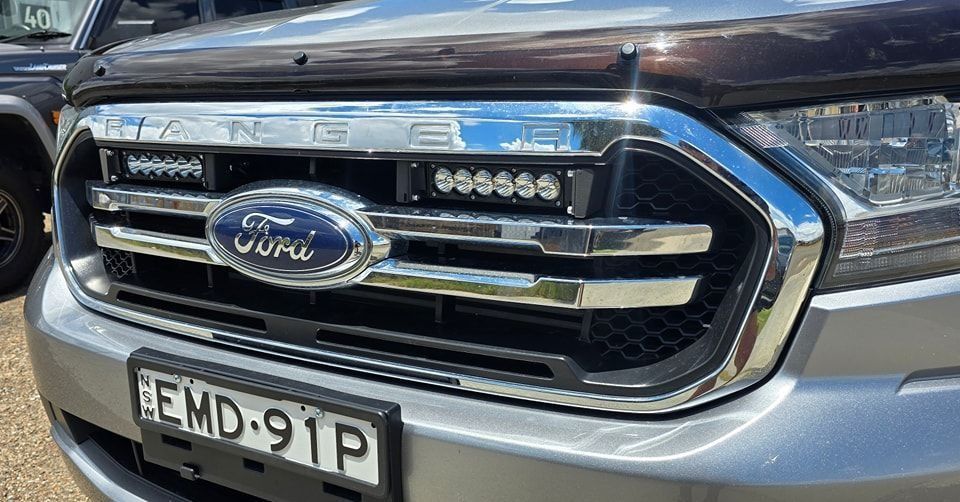 The Front Grille of a Ford Ranger With a License Plate — Sparky's 4x4 Auto Electrical In Taminda, NSW
