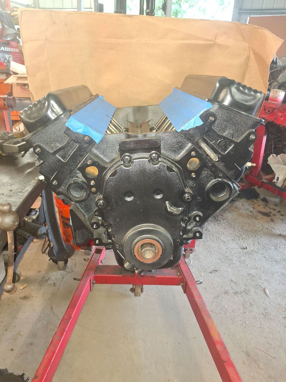 A pile of metal pieces with holes in them