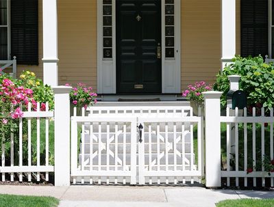 White Fence with Gate Over the Garden — Hickory, NC — Fister Fence of Hickory LLC