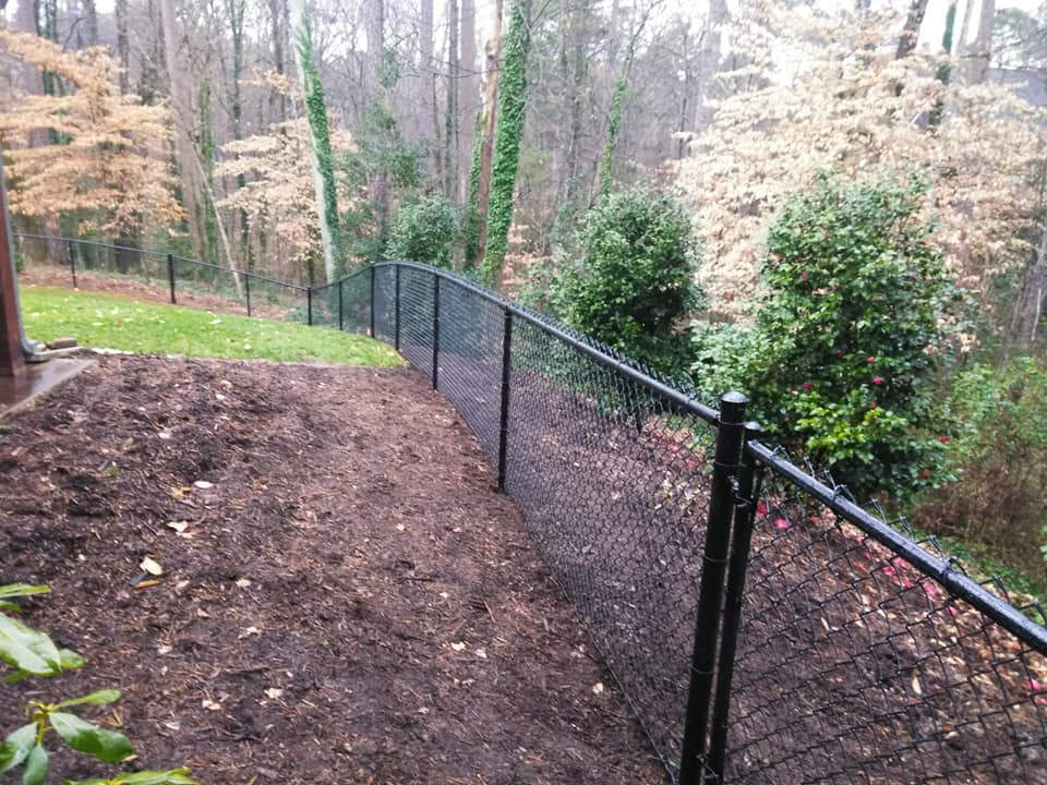 Black Chain Link Fence Slope — Hickory, NC — Fister Fence of Hickory LLC