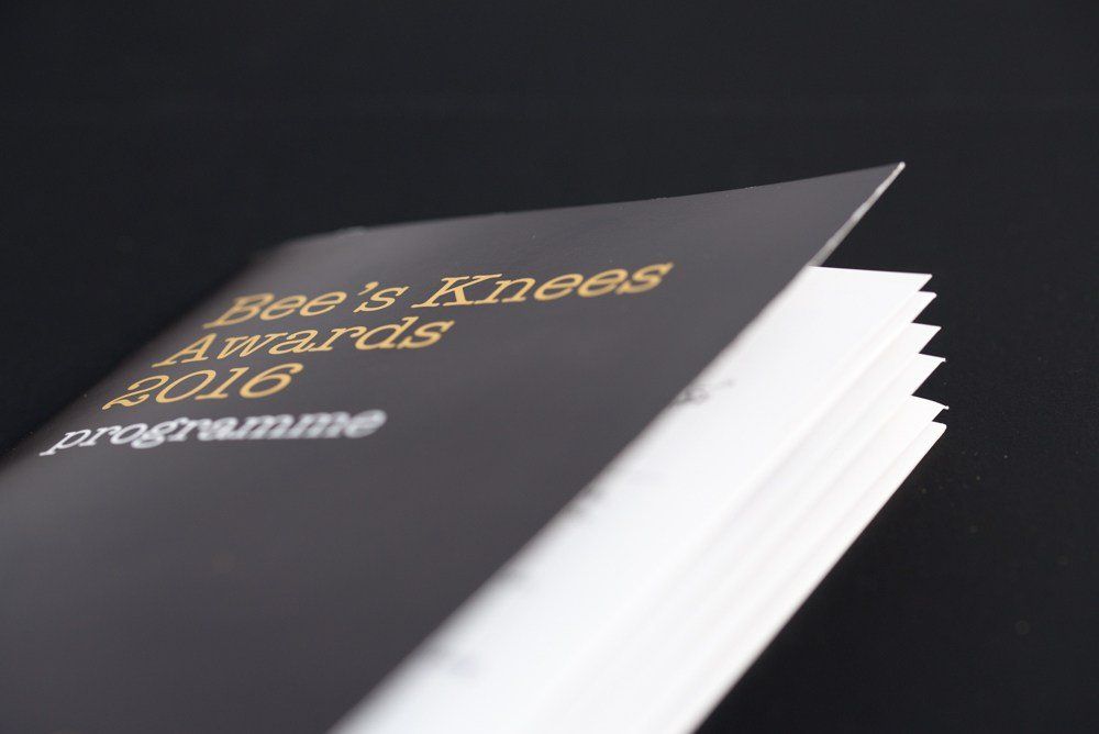 A black book titled bee 's knees awards 2016