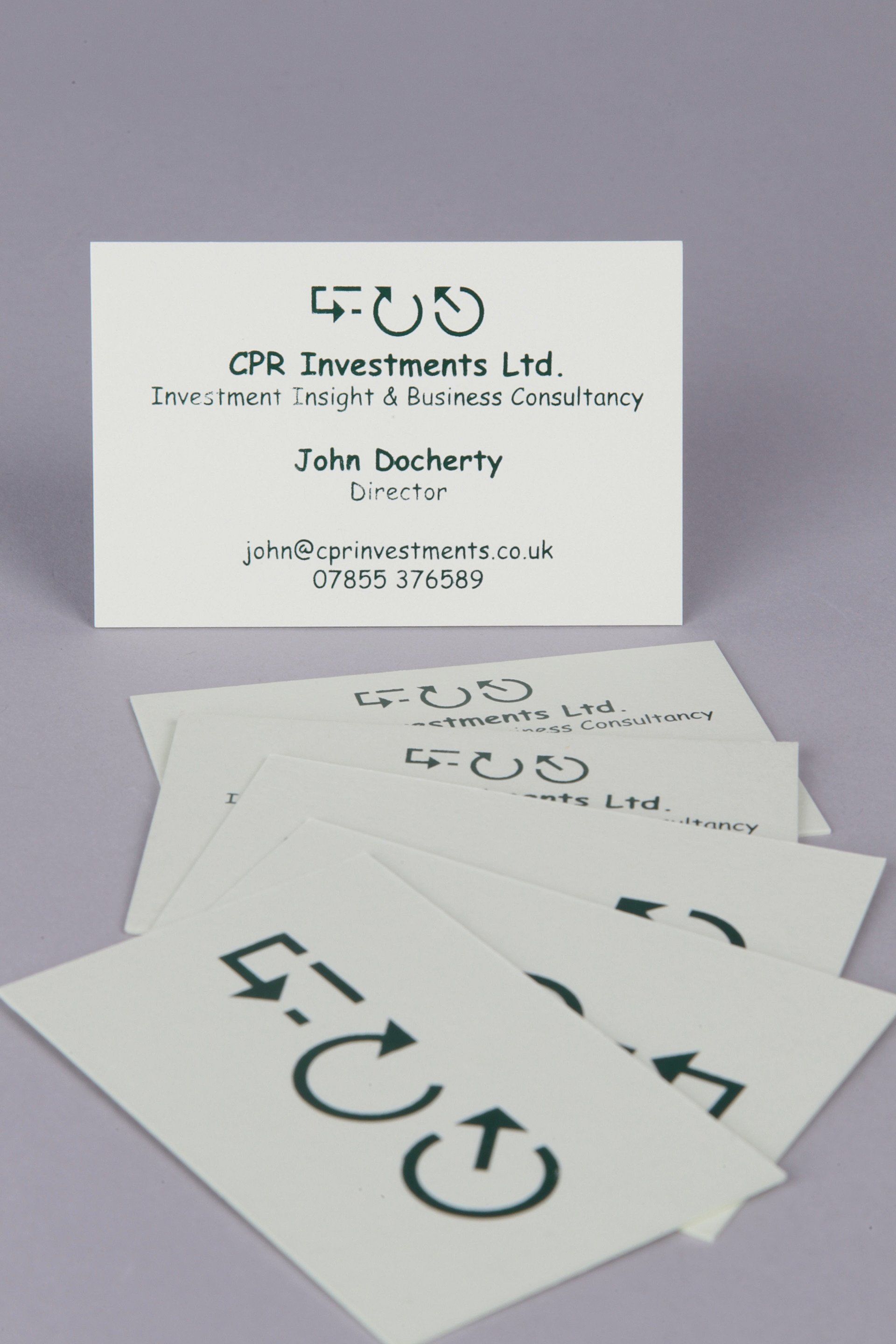 A stack of business cards for cpr investments ltd