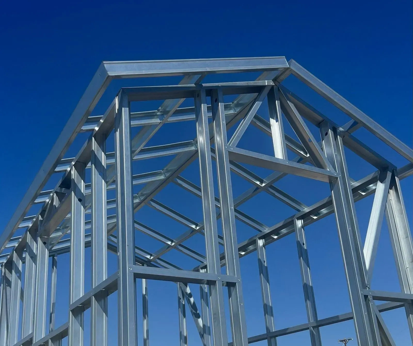 A metal structure with a blue sky in the background