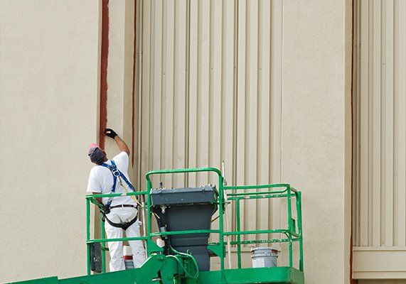 Painting Contractor — Painting on the Building in Central Florida