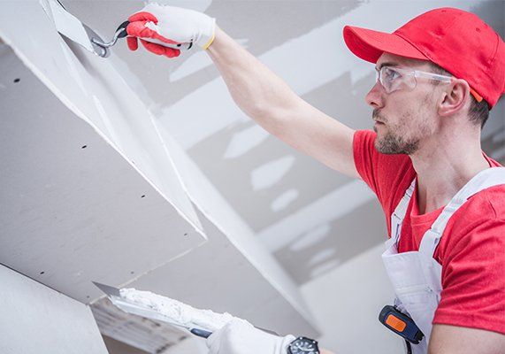 Painting Works — Painter Finishes the Wall in Central Florida