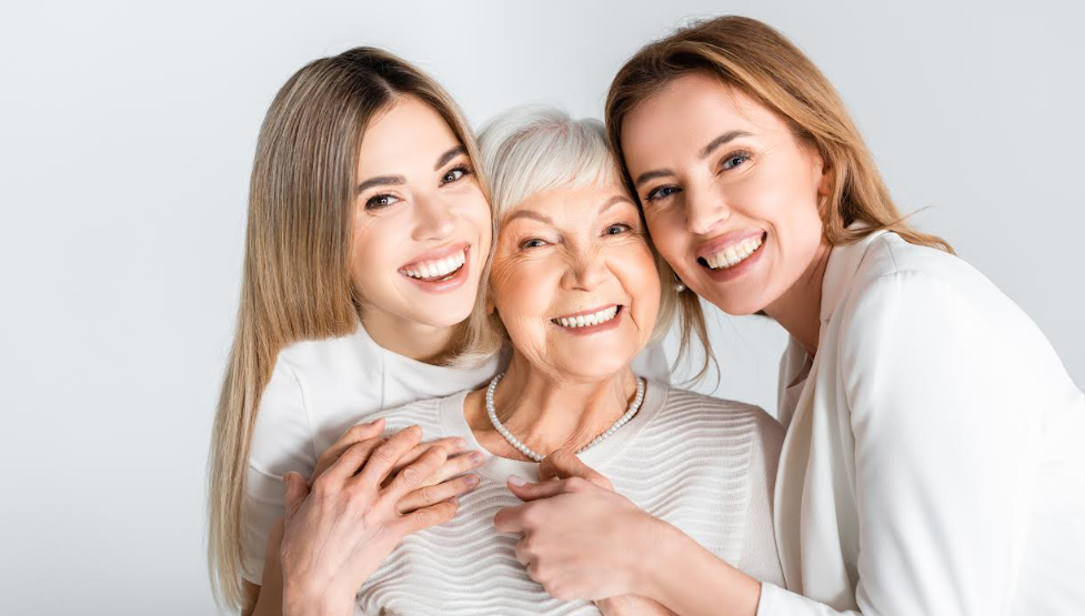 Photo of three women of various ages.