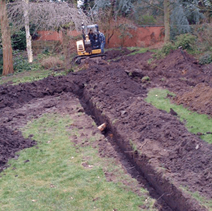 digging a trench with mini excavator