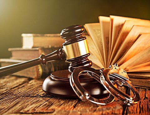 Criminal Law — Wooden Gavel and Books on Wooden Table in San Diego, CA