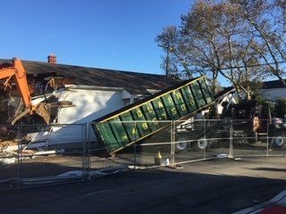 Junk Hauling — Transferring Junk From A Dumpster in Middletown, NJ