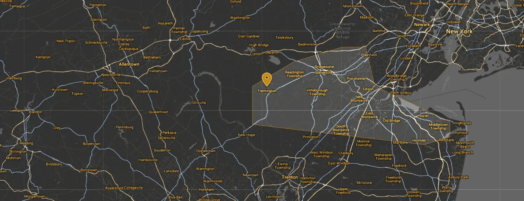 Map of Eastern US with illuminated cities, major roadways, and a highlighted region.