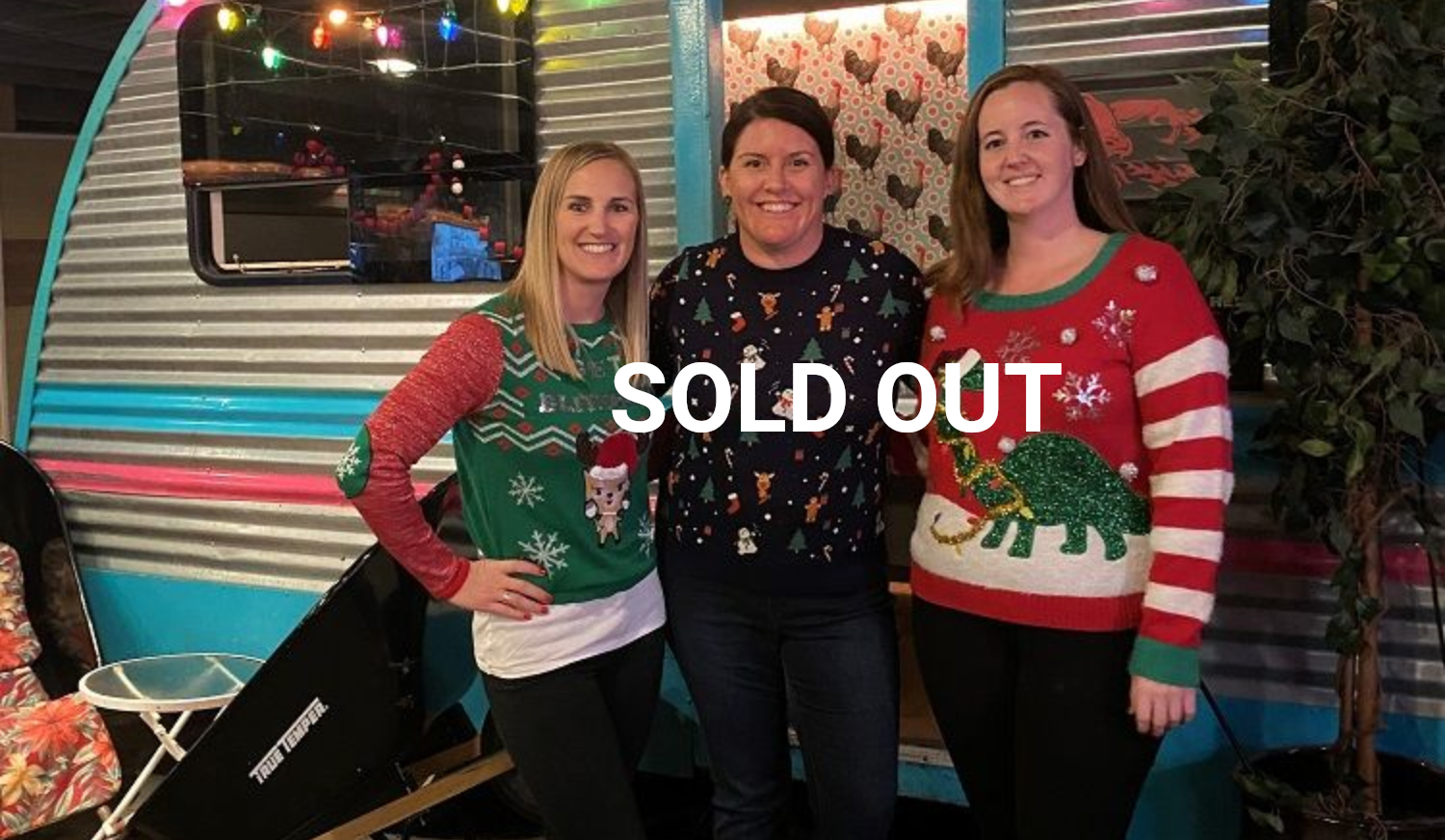 Women in holiday sweaters