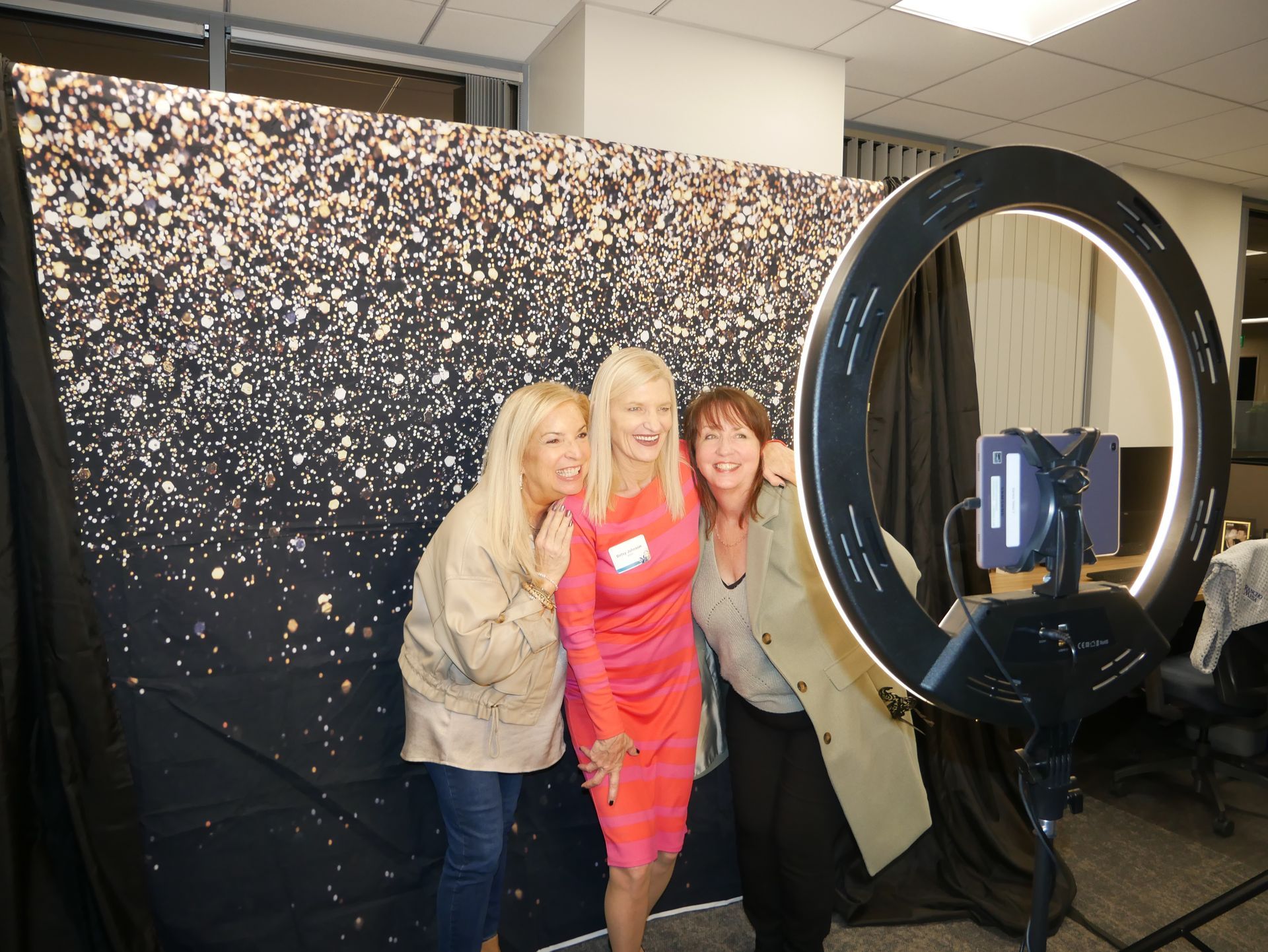 three PWI members in photo booth