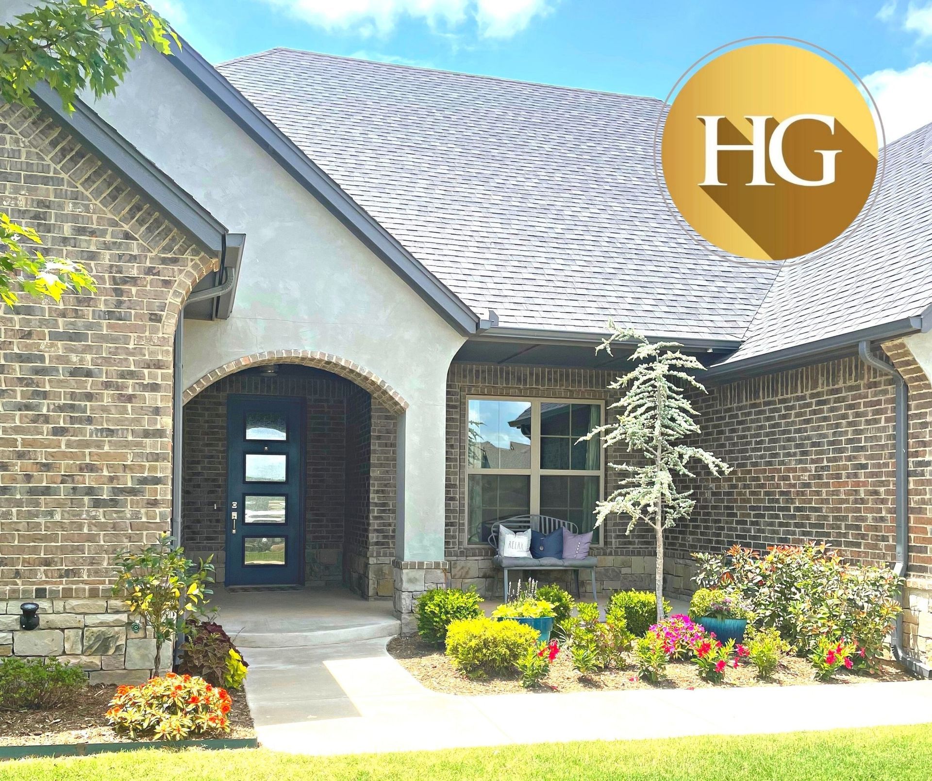 A house with a hg logo on it