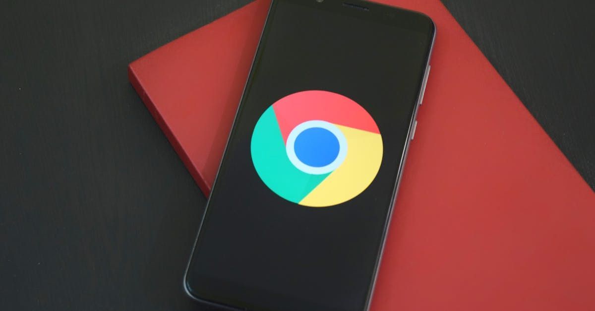 A cell phone with a google chrome logo on the screen.