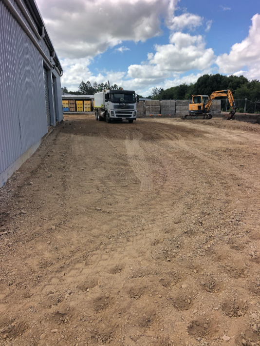 A Dirt Extension With A Truck In the Back Middle And Shed To The Left— A2Z Property Services In Kybong, QLD
