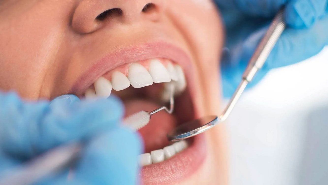 dental procedure being performed on female patient