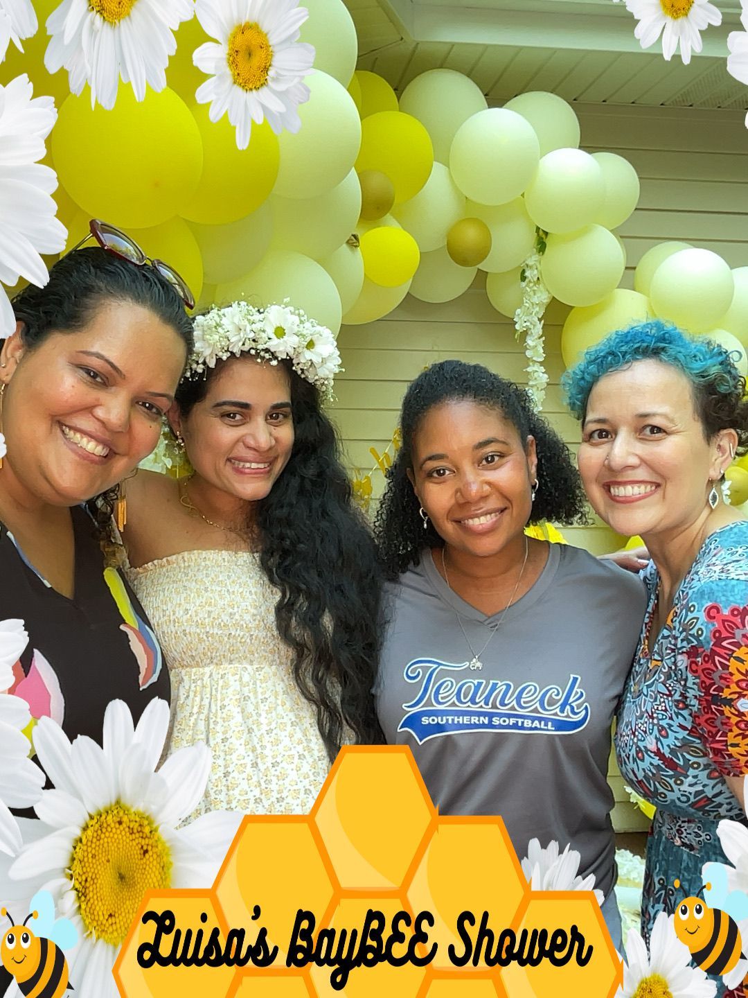 A group of women are posing for a picture at a luisa 's baybee shower
