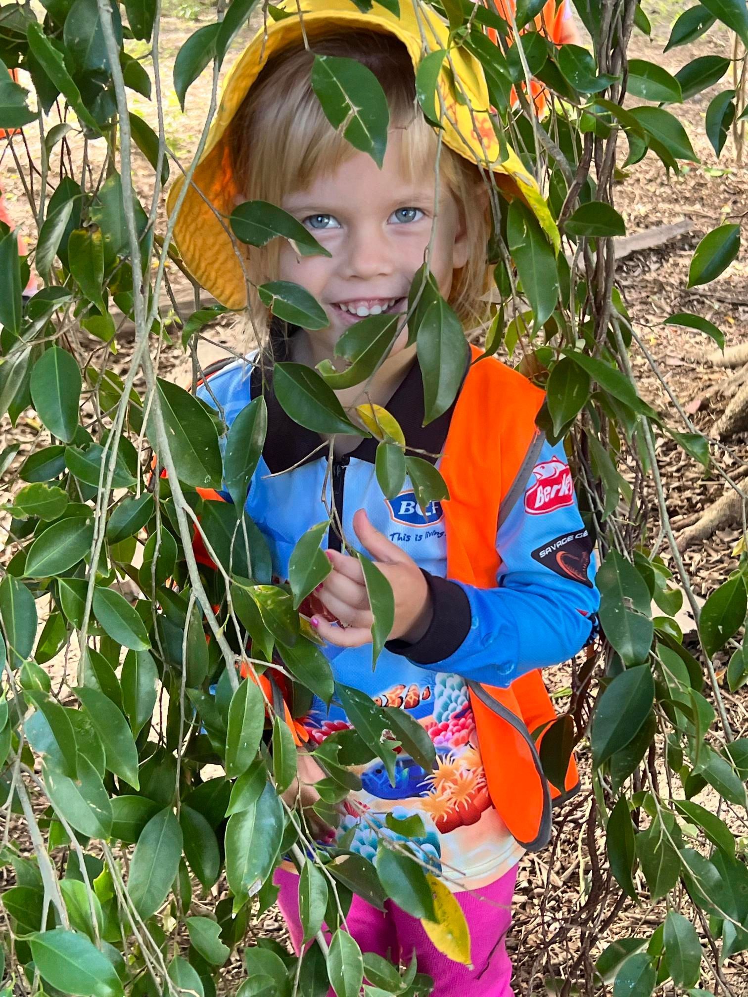 Two Little Girls Are Playing In A Tree In A Park – Bundaberg North, QLD - Cradle to Crayons Education & Care