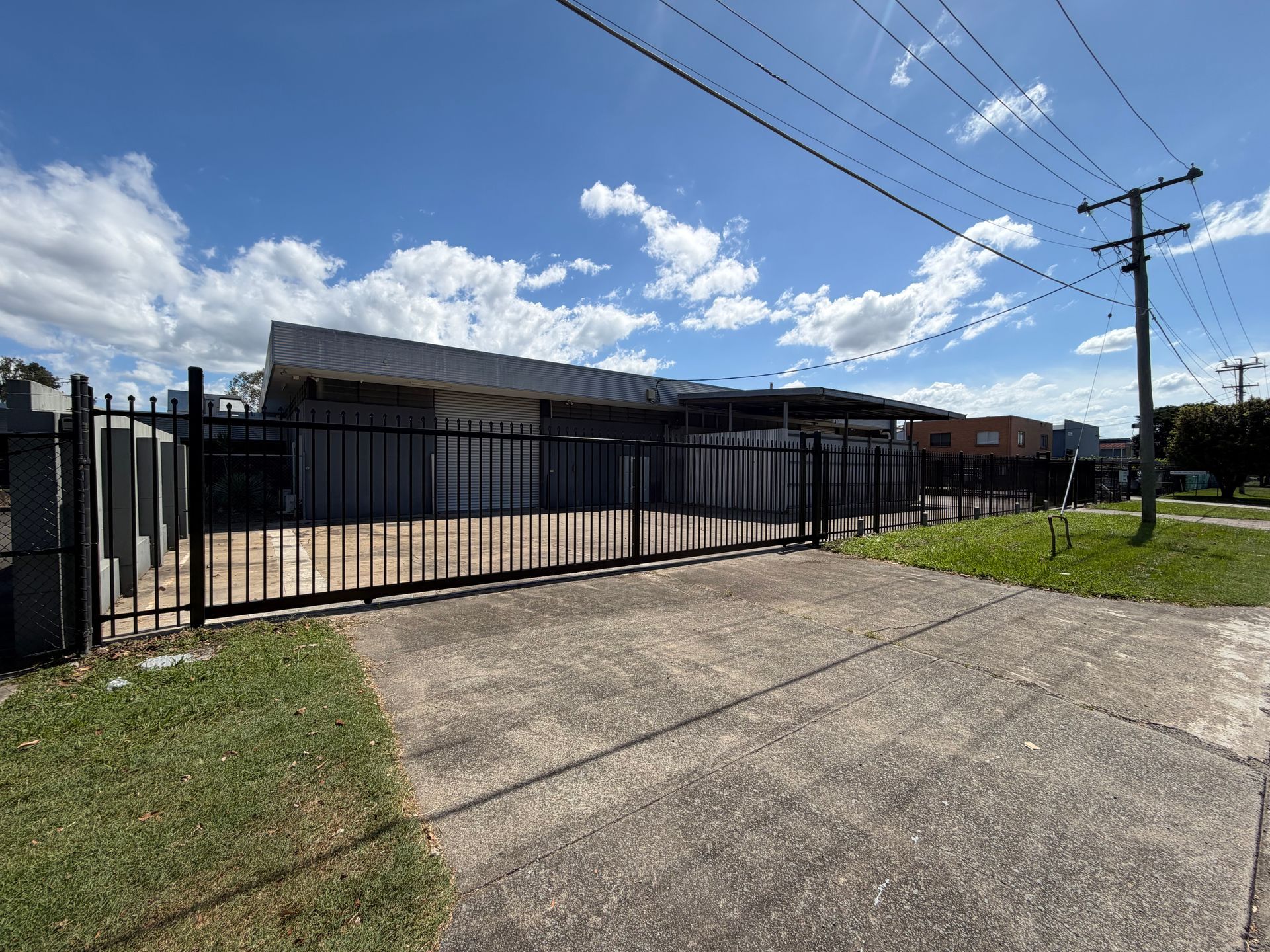 Security Picket Fence & Gate around Commercial Property Perimeter in Brisbane suburb of Acacia Ridge