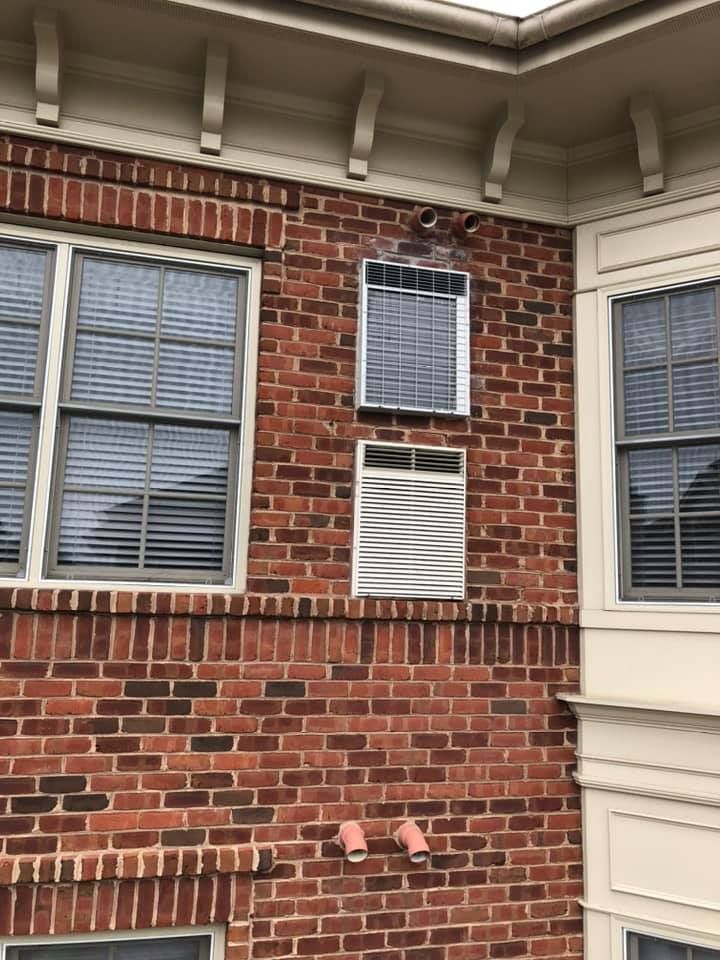 An aerial view of a large wave in the ocean.