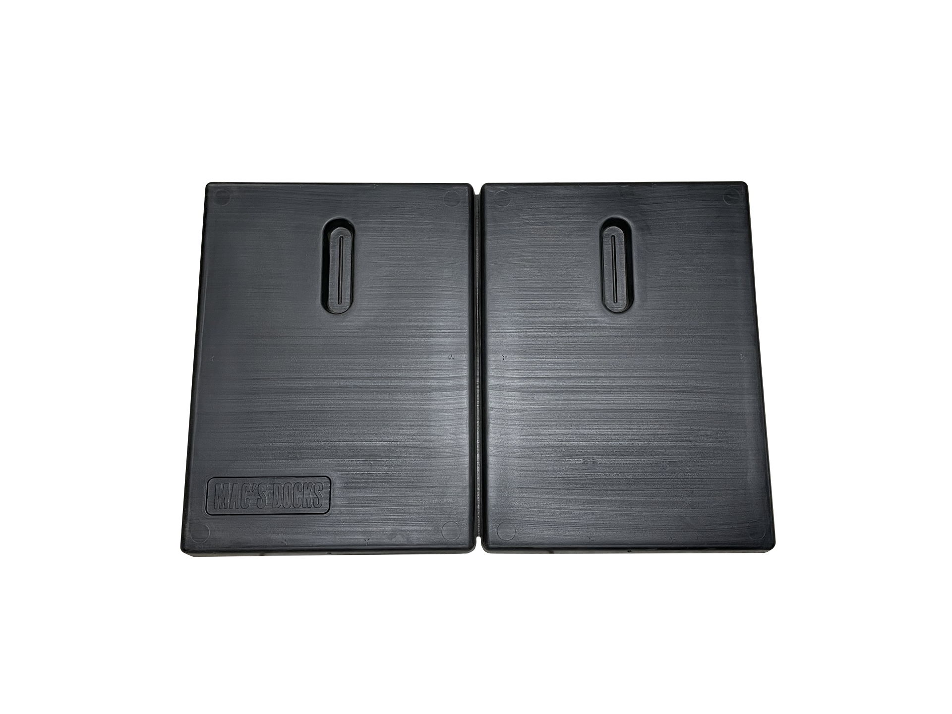 A pair of black rubber pads with holes in them on a white background.