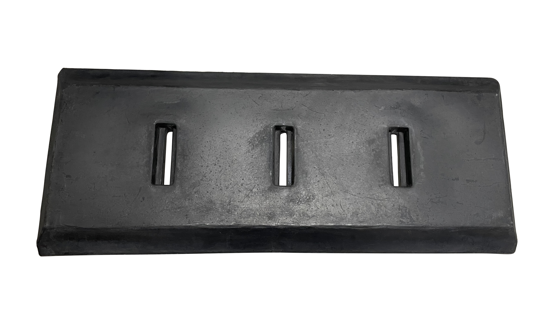 A black plastic block with four holes in it on a white background.