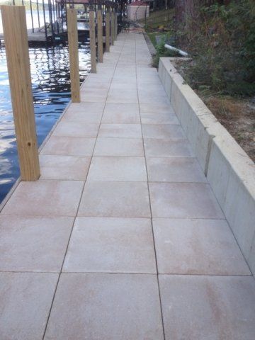 A dock with a walkway leading to the water