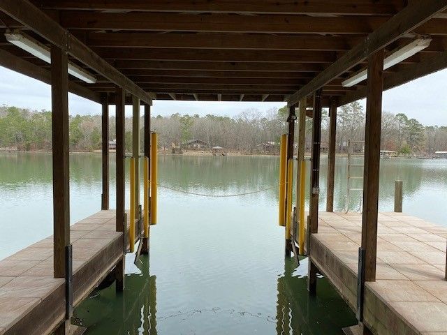 A wooden dock overlooking a body of water