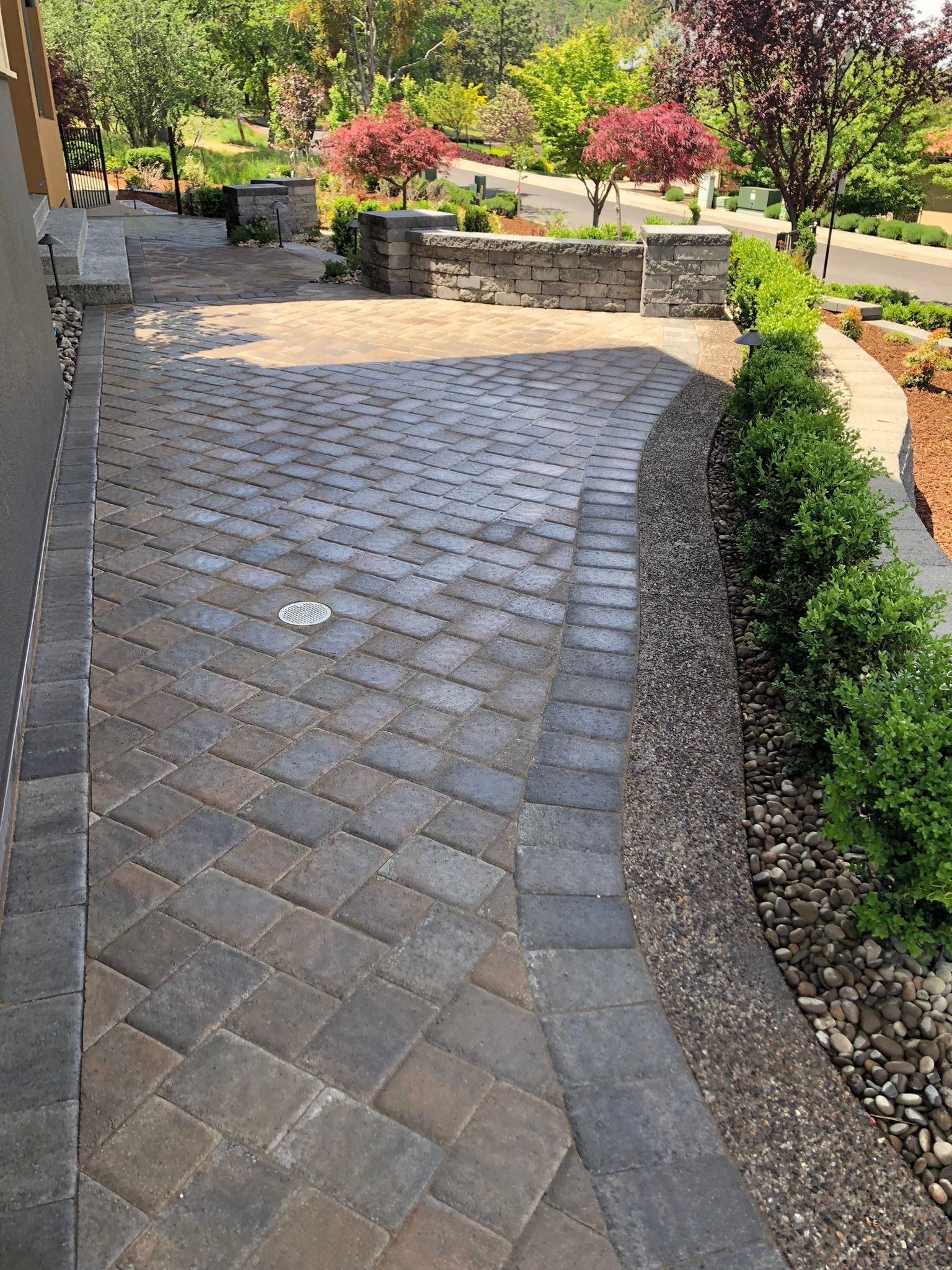 concrete patio with brick pavers in Ashland, Oregon.