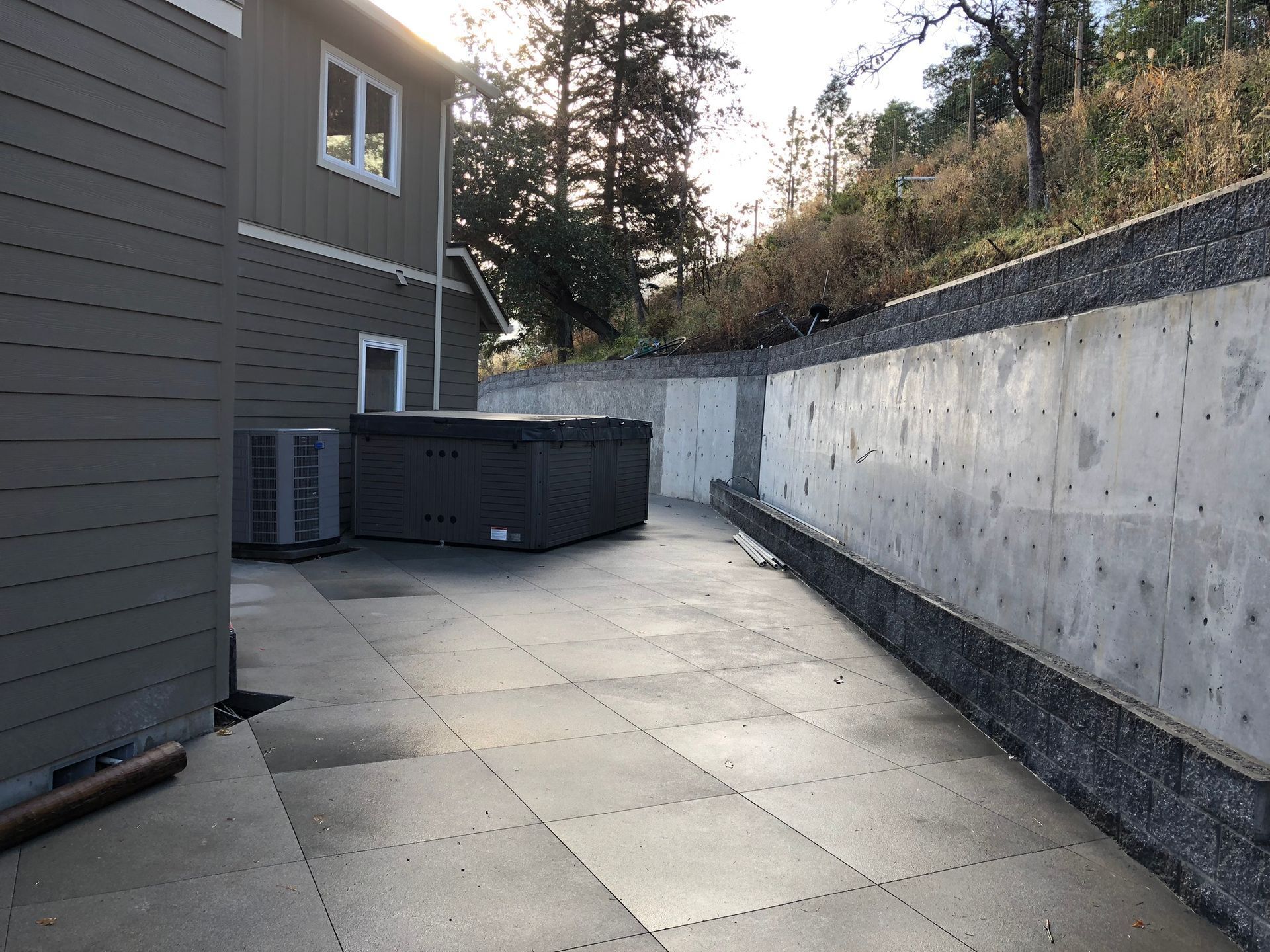 Concrete patio and retaining wall in Talent, Oregon.