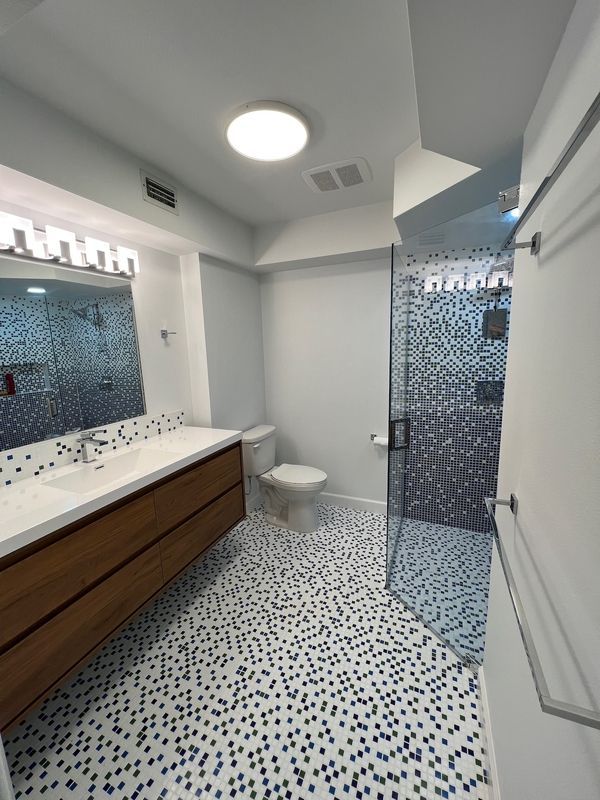 Mosaic tile bath by RIM Express