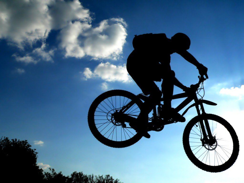 mountain biker mid jump
