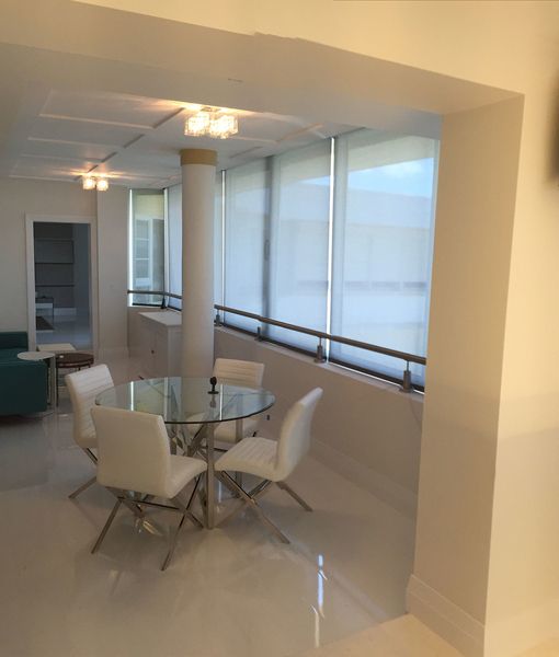 Living Room with Glass Table and Chairs — Coral Springs, FL — Solun Window Fashions & Automation