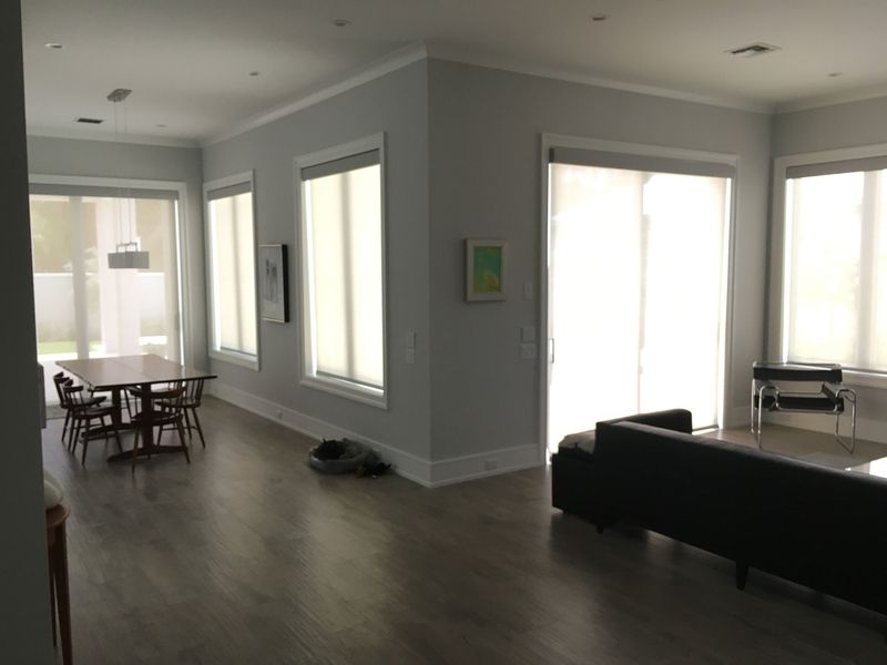 Living Room with Wooden Flooring — Coral Springs, FL — Solun Window Fashions & Automation