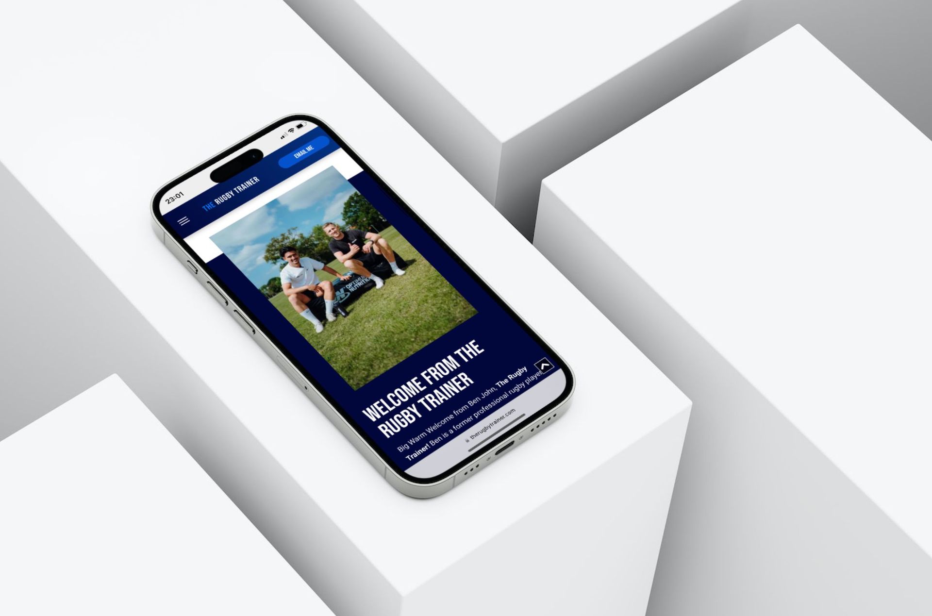 A cell phone is sitting on top of a white cube.