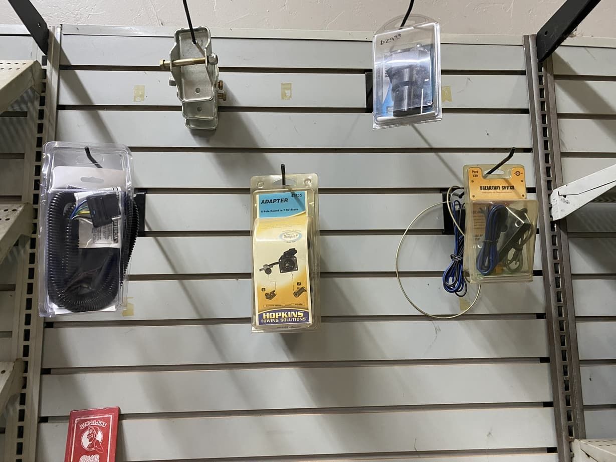 A wall with a bunch of tools hanging on it