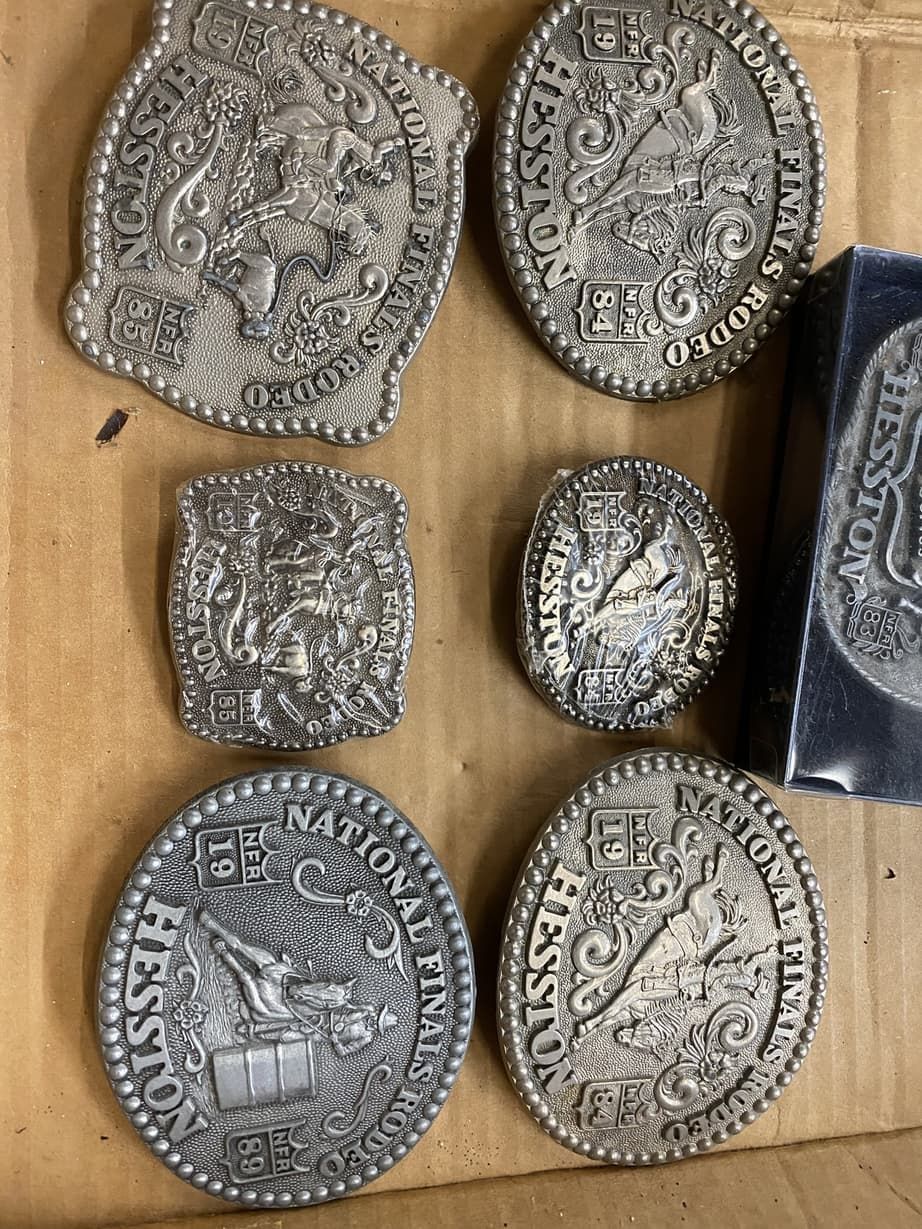 A bunch of silver coins are sitting on a table