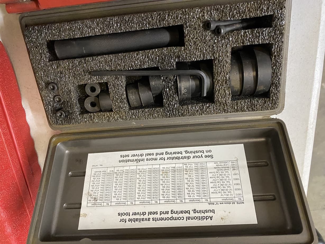 A box with a lot of tools inside of it