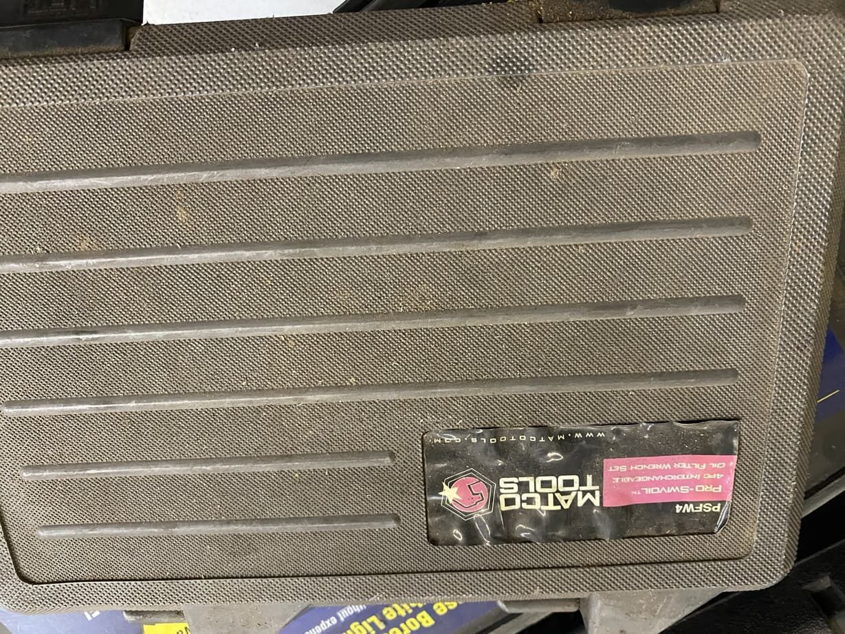 A close up of a toolbox with a label that says master tools