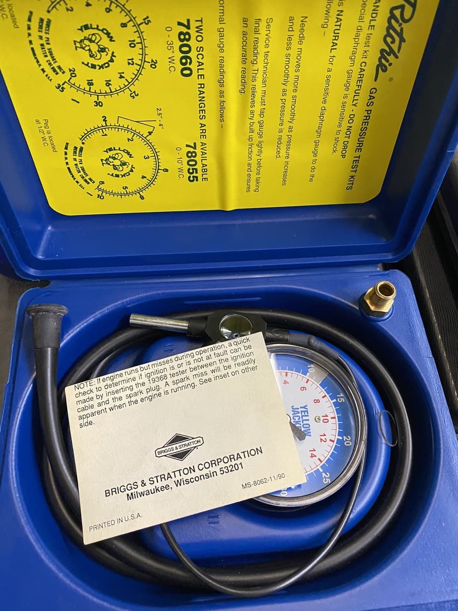 A blue box with a hose and a card that says pacific tools
