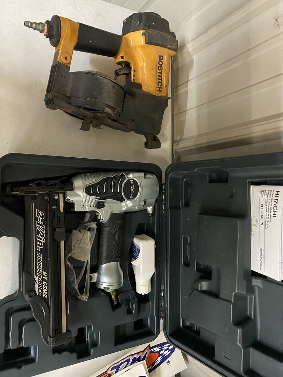 a silver tool in a wood case