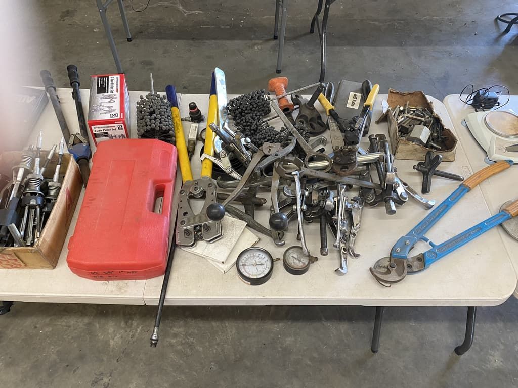 A table with a bunch of tools on it