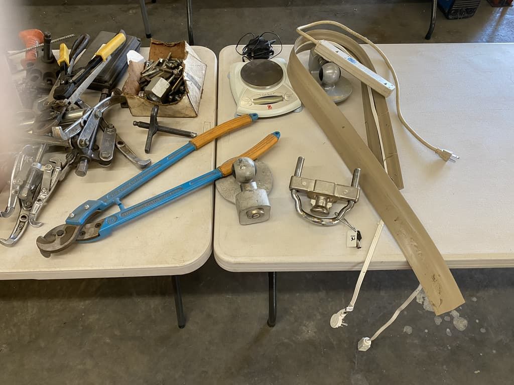 A table with a bunch of tools on it