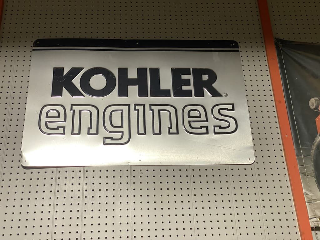 A sign on a wall that says kohler engines
