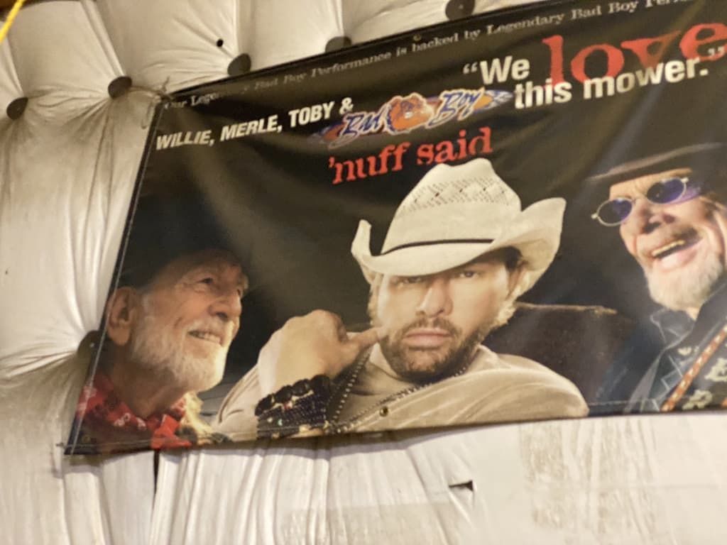 A poster that says we love this mower huff said