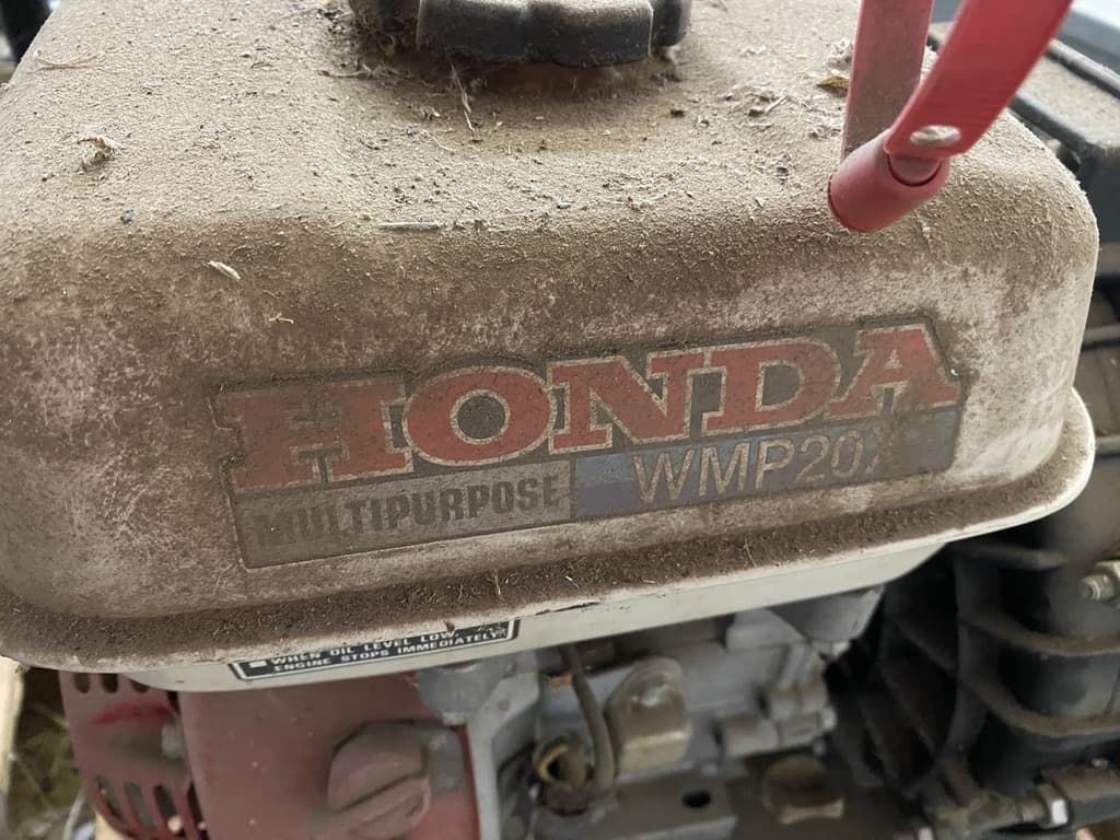 A close up of a honda multipurpose engine