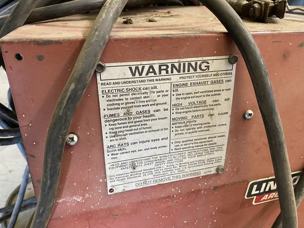 A red box with a warning label on it