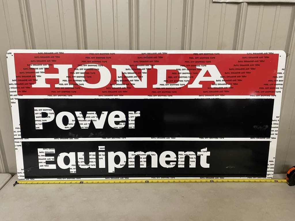 A red white and black honda power equipment sign