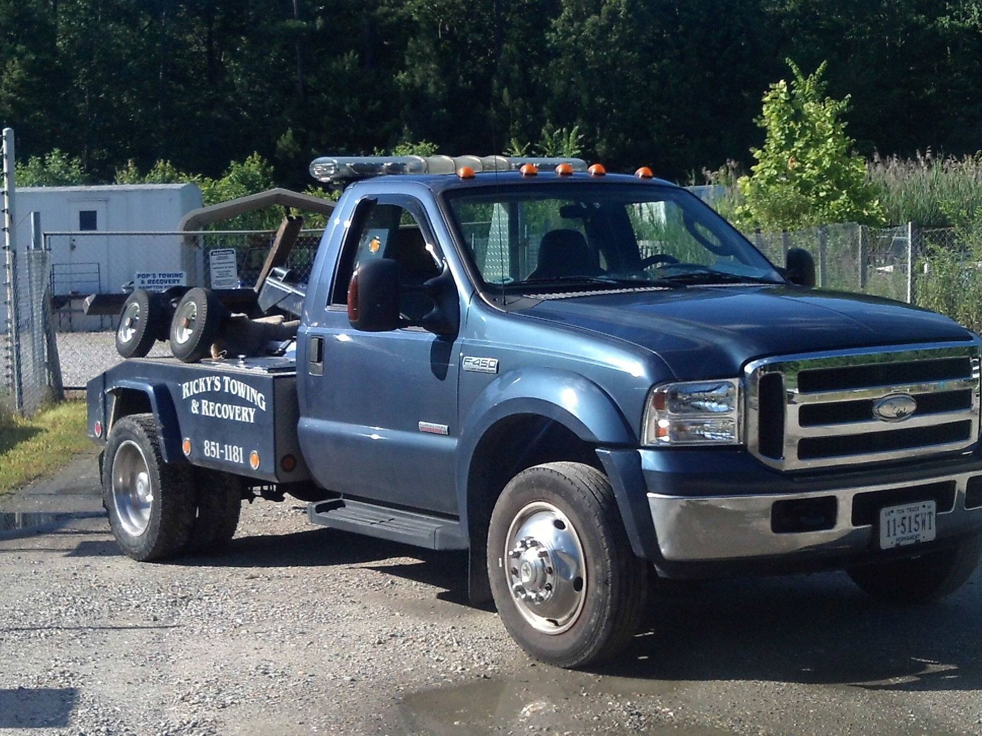 A payless shoesource store with a blue awning